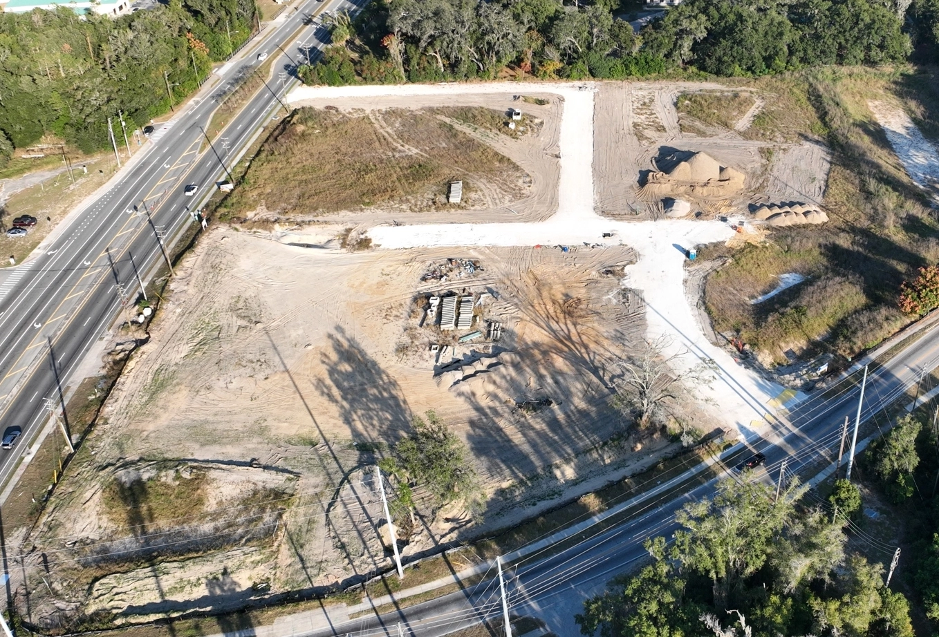 Aerial view of a construction site with detailed mapping and data visualization captured by drone technology, illustrating the precision and comprehensive coverage of modern drone mapping in construction.