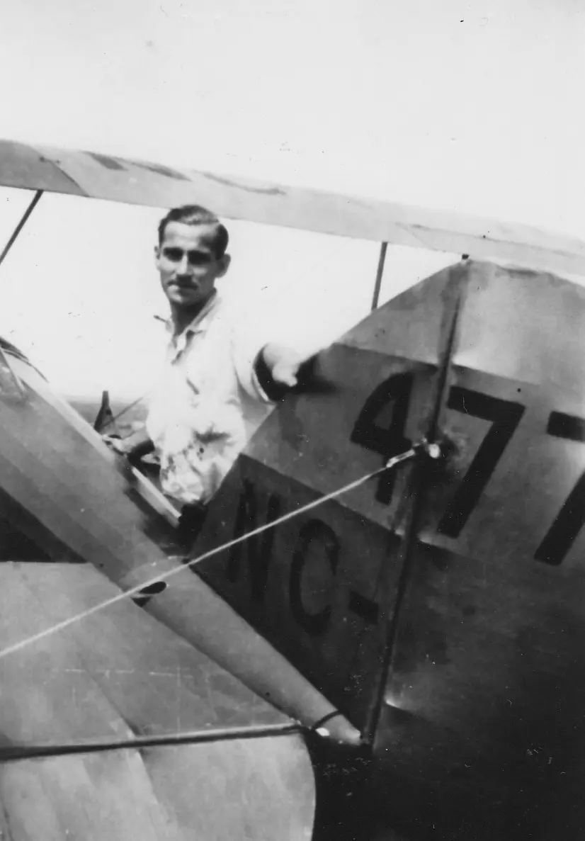 Aviation Roots to Orlando’s Premier Aerial Services Historic photo of Skyland Pixels’ founder’s grandfather standing with his airplane.