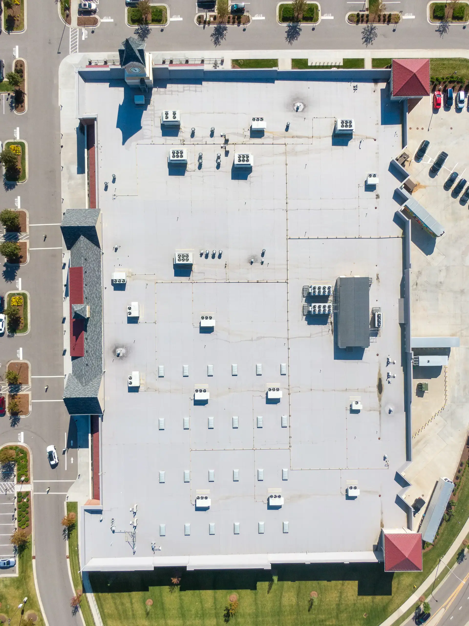 Aerial view of a commercial building roof inspection in Orlando.